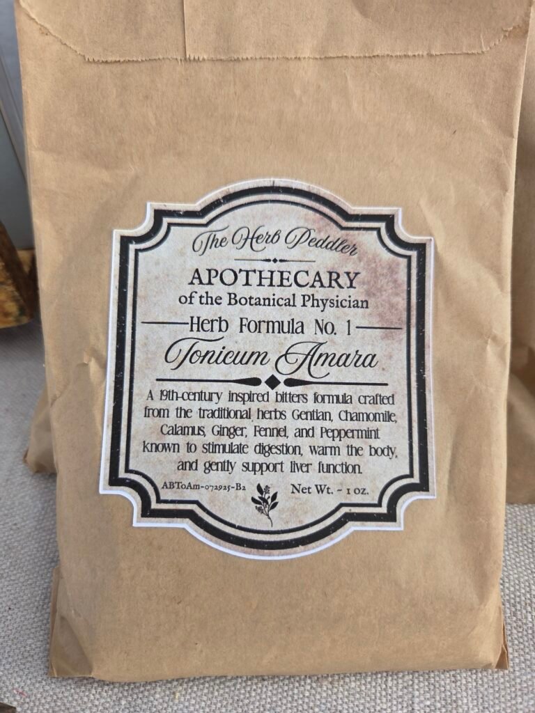 Tonicum Amara aromatic digestive bitters formula with gentian root and chamomile in a paper sack - The Herb Peddler