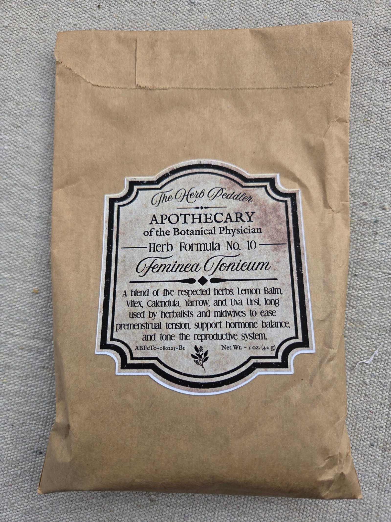 Feminea Tonicum women's health formula with red raspberry leaf and chasteberry in a paper sack - The Herb Peddler