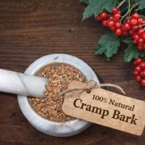 Cramp bark dried in a mortar and pestle with Viburnum opulus plant - The Herb Peddler