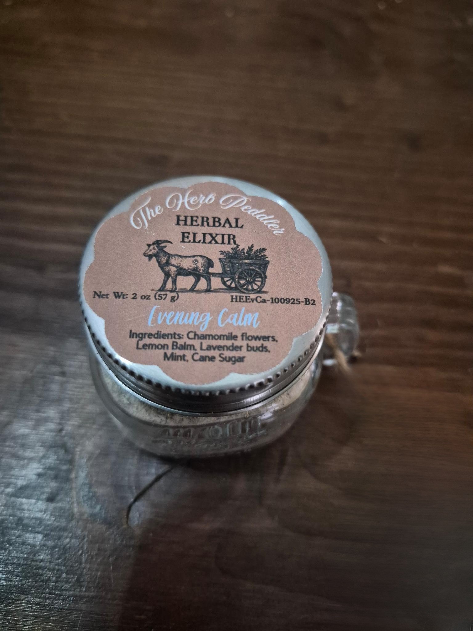 Evening Calm dry herbal elixir blend in a glass jar with chamomile, lavender, lemon balm, and spearmint - The Herb Peddler